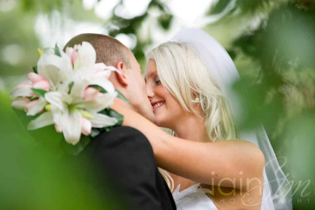 Kissing Bride and Groom