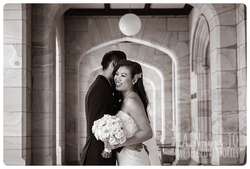 The groom, Duc, whispers beautiful things to his bride