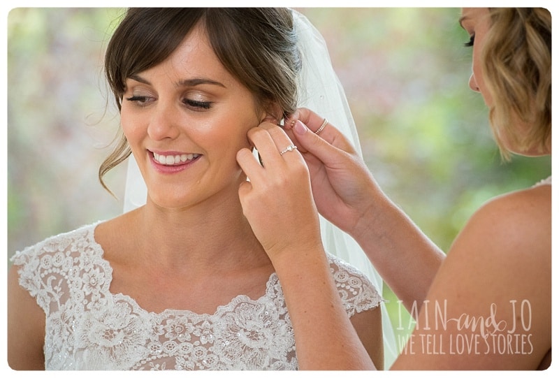 Putting the Earrings of the Bride