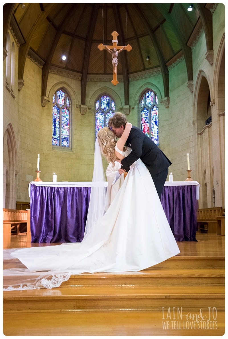 Groom Kissing The Bride