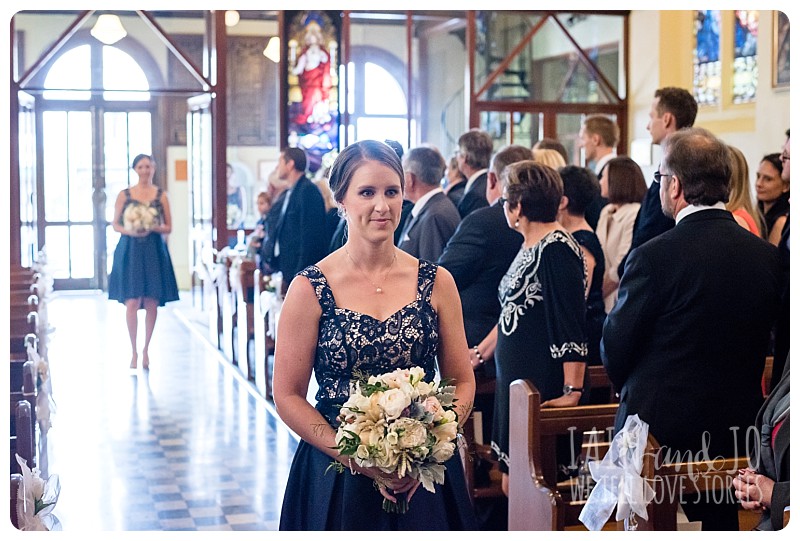 Bridesmaid walking down the aisle