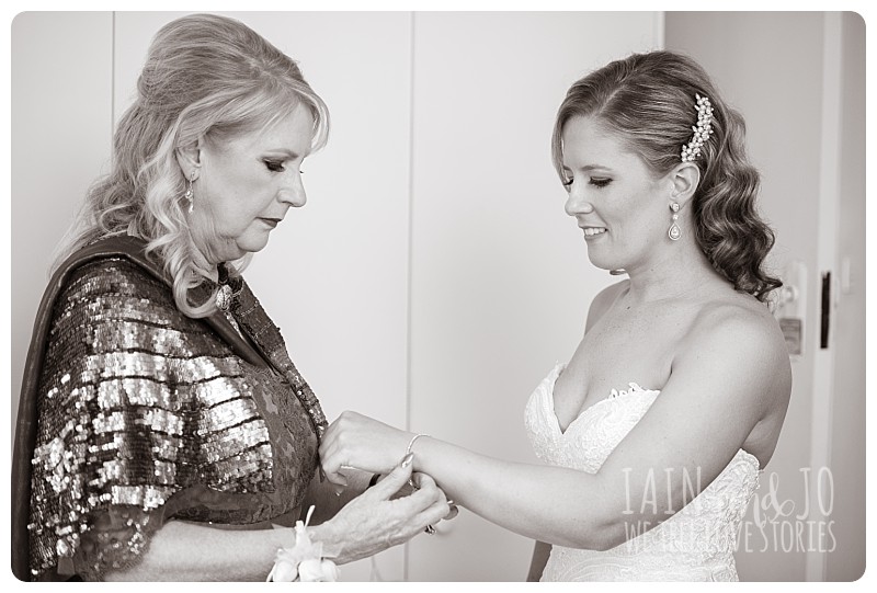 Mum puts bride's bracelet