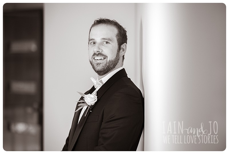 Black and white photo of groom