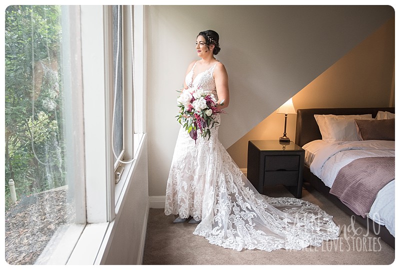 Bride looking at the window