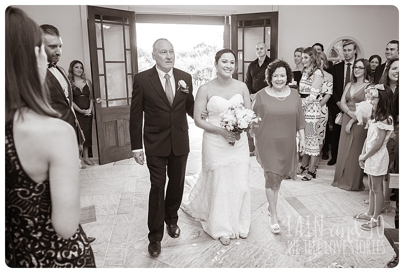 Bride enters chapel with parents