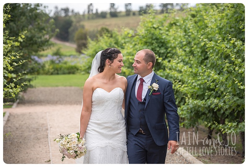 Bride and groom take a walk