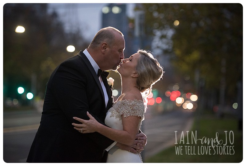 Bride and groom kiss